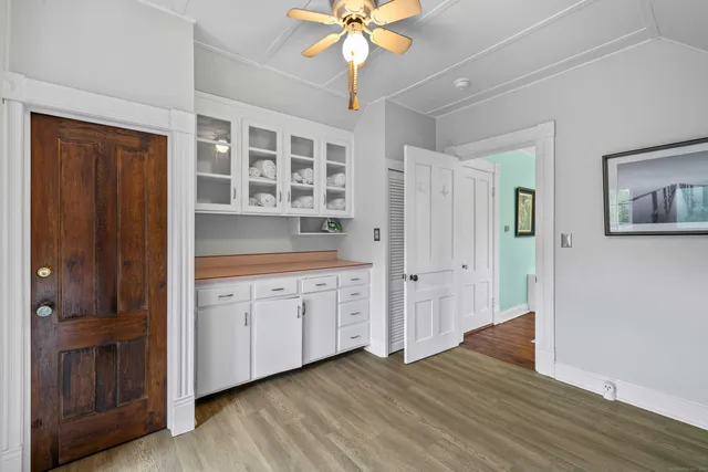 a bedroom with furniture and a window