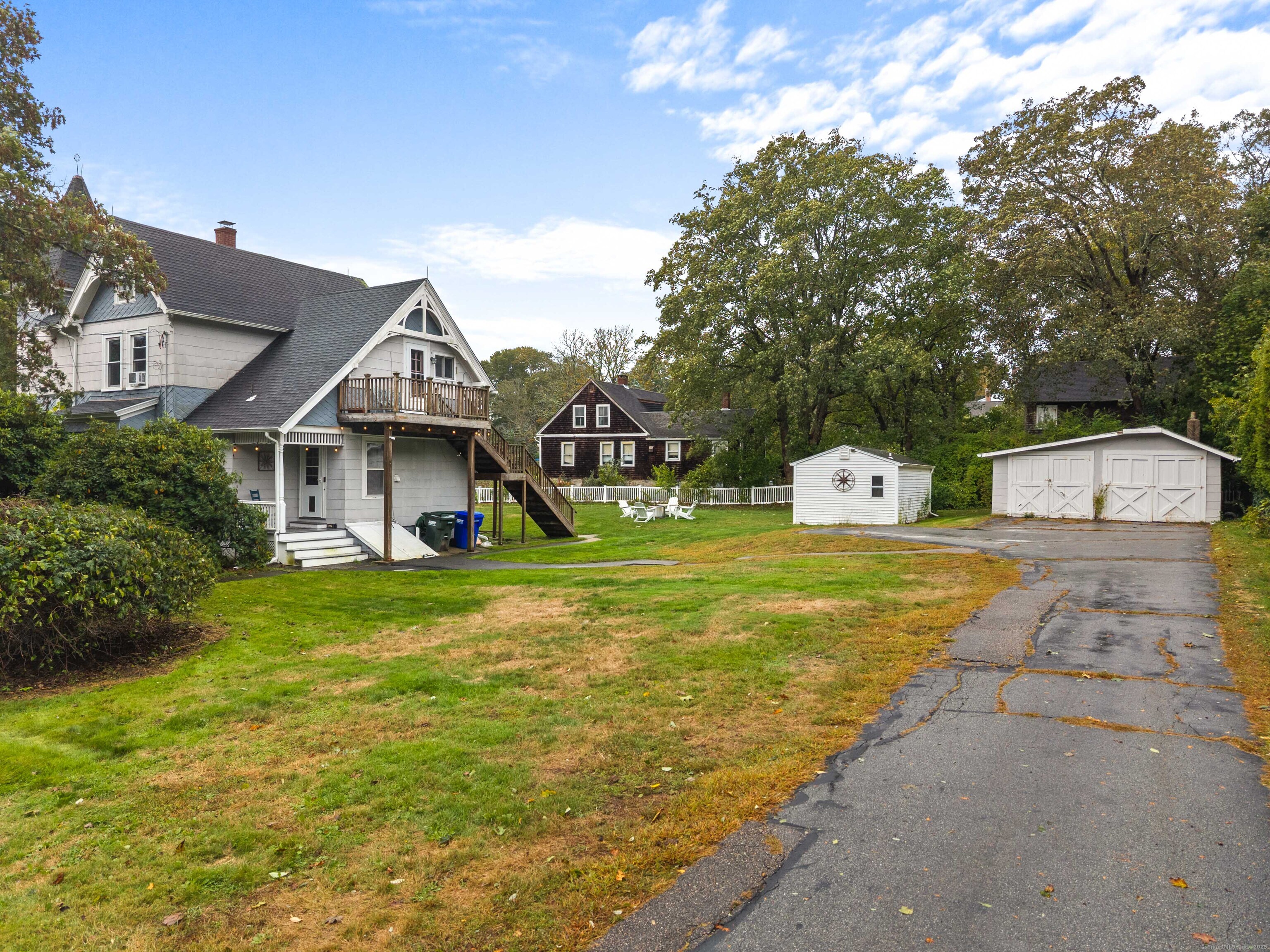 16 Prospect Hill Road Groton, CT 06340 - Photo 35 of 38 a front view of a house with garden