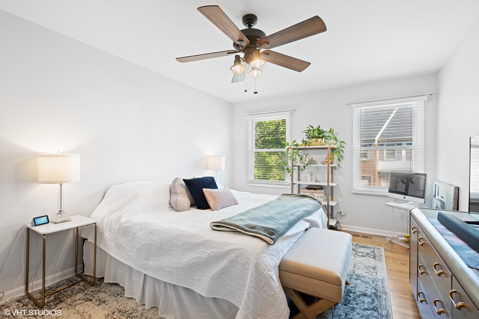 163 Bright Ridge Drive Schaumburg, IL 60194 - Photo 11 of 15 a bedroom with a bed and a chandelier