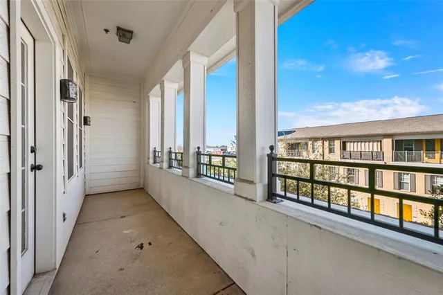 a bathroom with a tub shower and sink