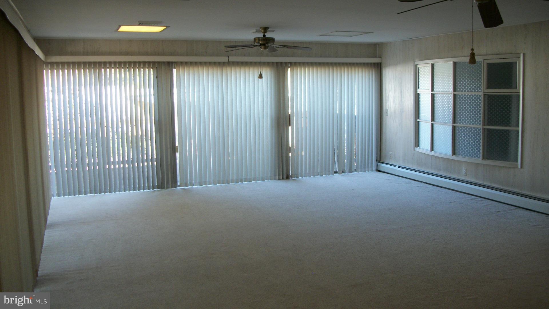 1404 Devils Reach Road Woodbridge, VA 22192 - Photo 15 of 55 Great Room with TWO Walls of Sliding Glass