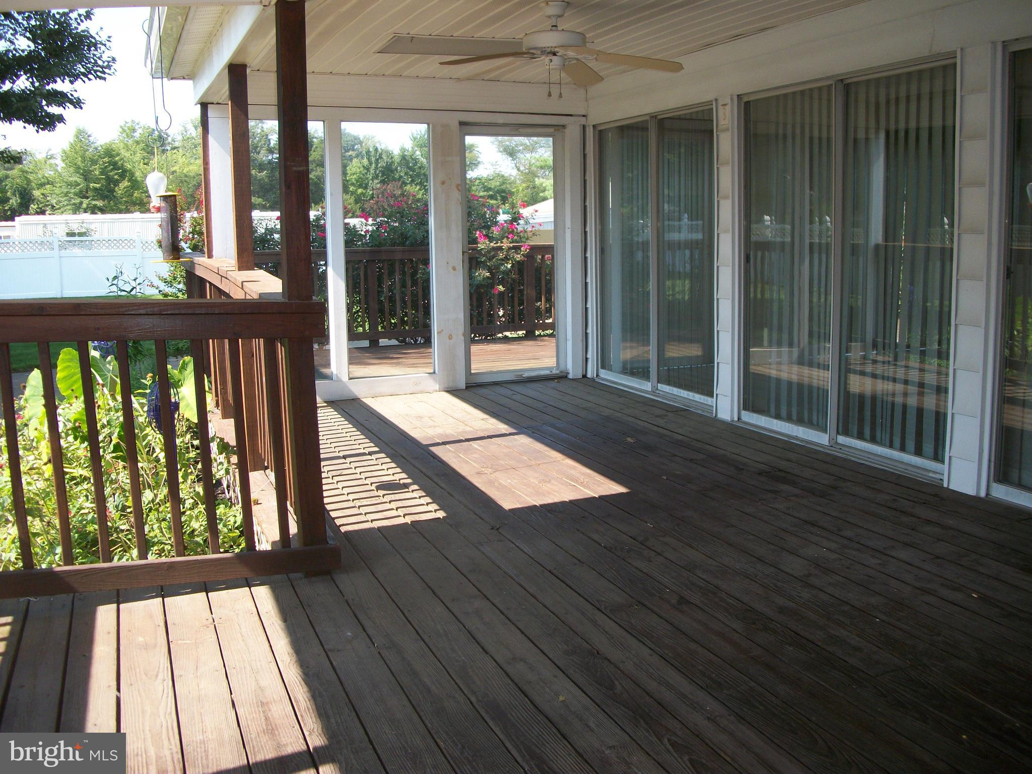 1404 Devils Reach Road Woodbridge, VA 22192 - Photo 4 of 55 Side Deck table area
