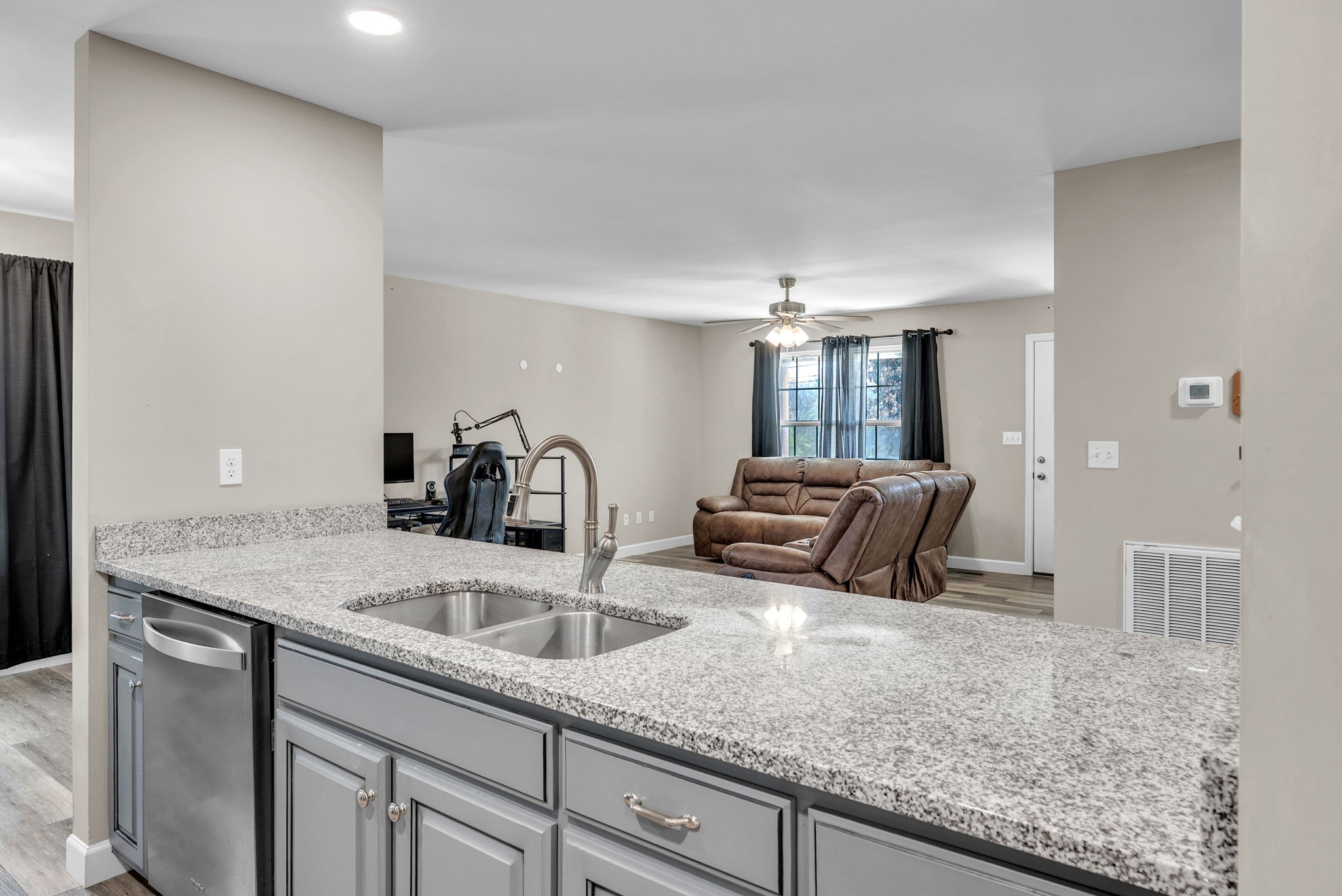 156 Old Post Road McMinnville, TN 37110 - Photo 18 of 33 a kitchen with stainless steel appliances granite countertop a sink and a granite counter tops