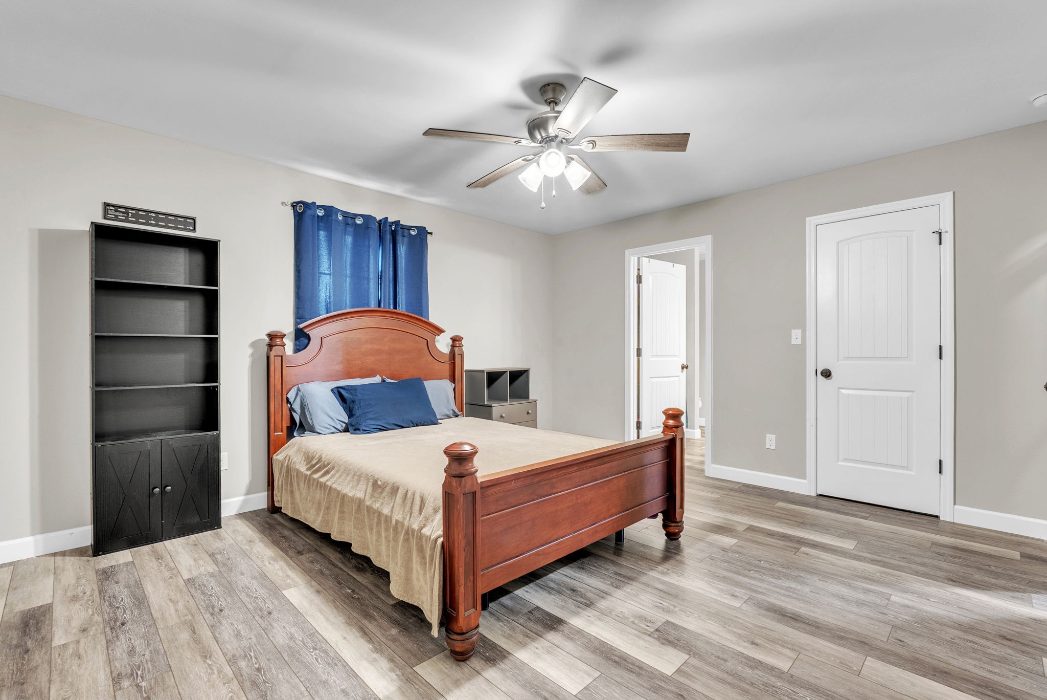 156 Old Post Road McMinnville, TN 37110 - Photo 20 of 33 a bedroom with a bed and a chandelier