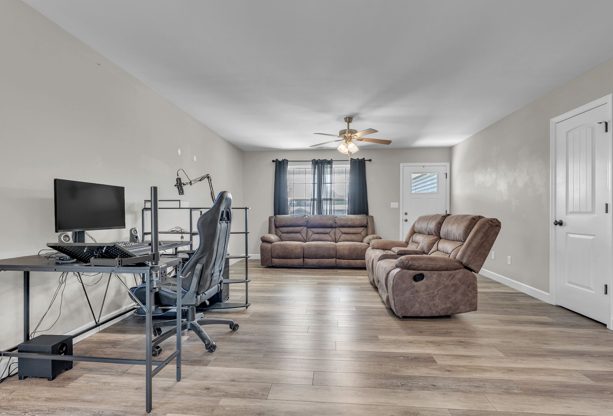 156 Old Post Road McMinnville, TN 37110 - Photo 9 of 33 a view of a livingroom with furniture and a flat screen tv