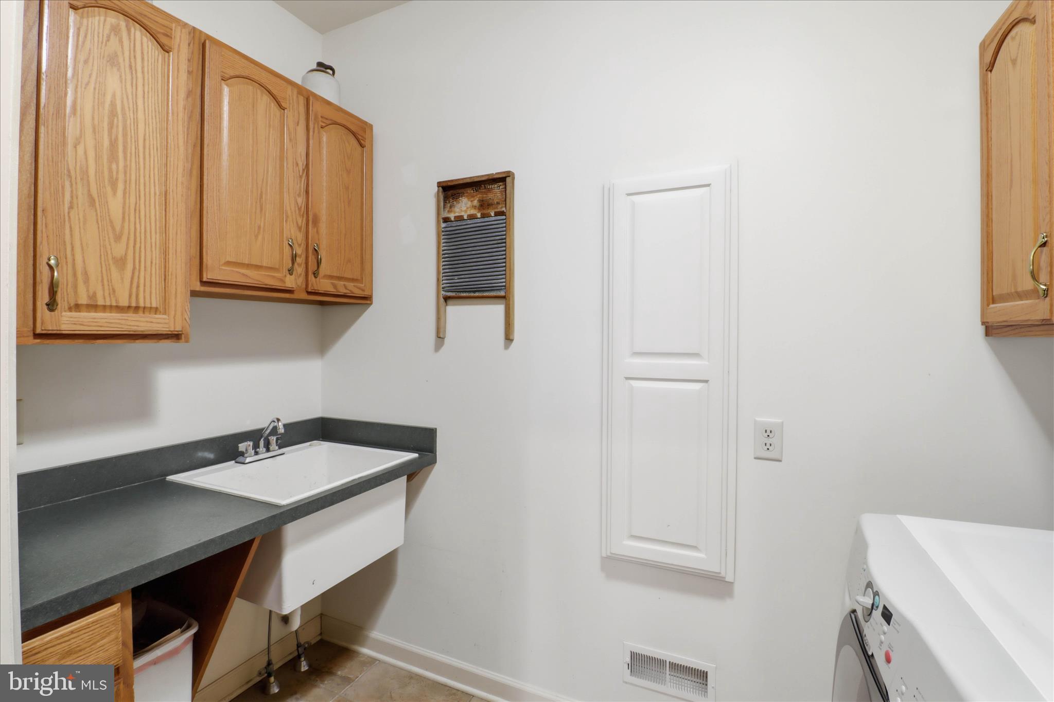 364 Evans Road Lititz, PA 17543 - Photo 24 of 58 Built in laundry tub and ironing board
