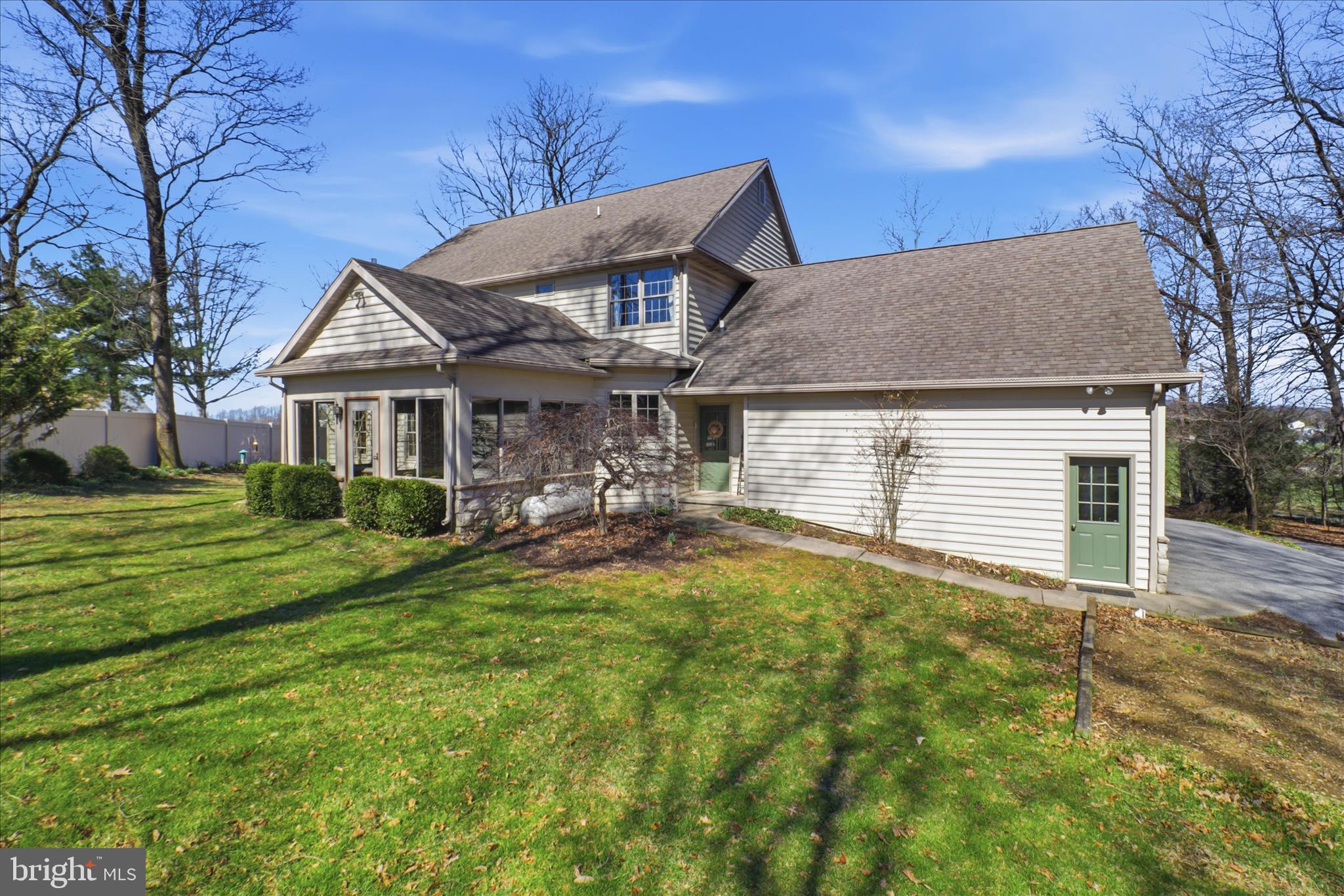 364 Evans Road Lititz, PA 17543 - Photo 50 of 58 a front view of a house with a yard table and chairs