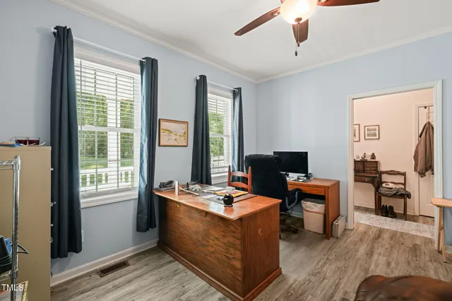 a room with furniture and a window