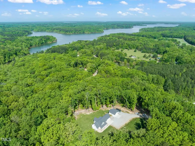 a view of a garden with a lake