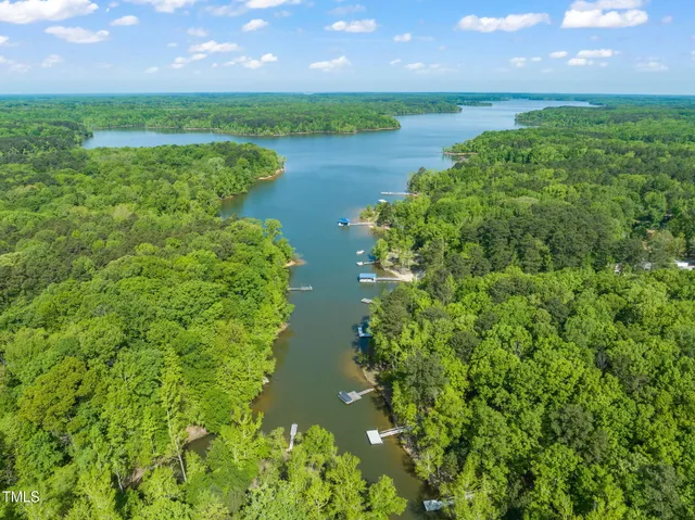a view of lake with green space