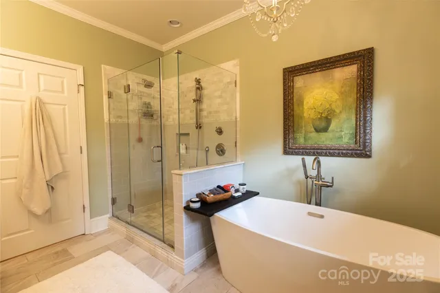 a bath tub sitting next to a bathroom sink