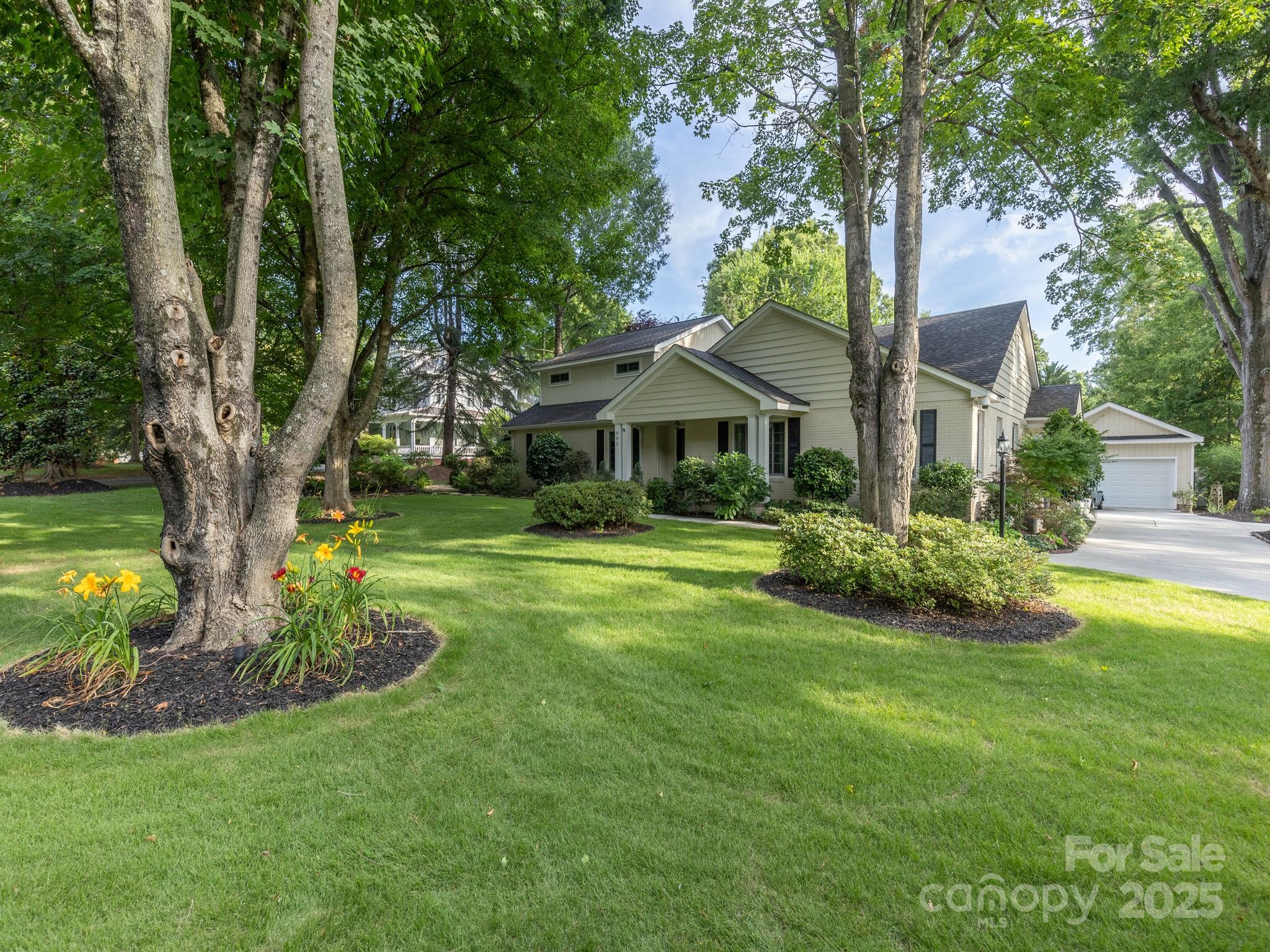 802 East Franklin Street Monroe, NC 28112 - Photo 14 of 48 a front view of a house with a yard