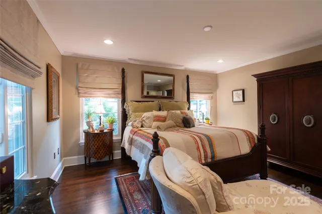 a bed room with a bed and a window