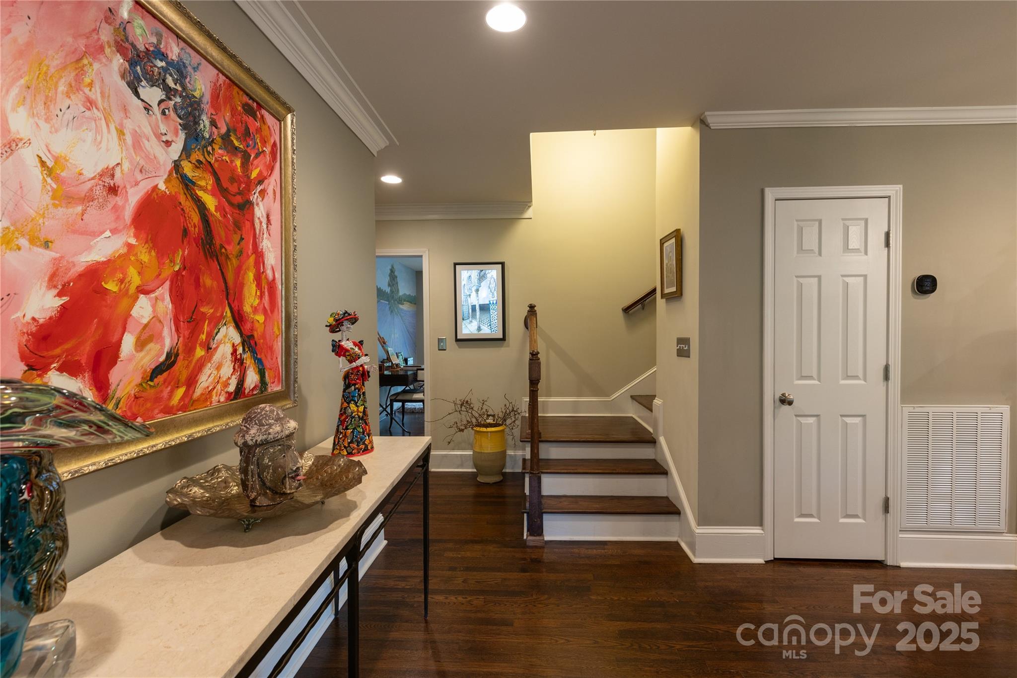 802 East Franklin Street Monroe, NC 28112 - Photo 31 of 48 a room with furniture and a wooden floor