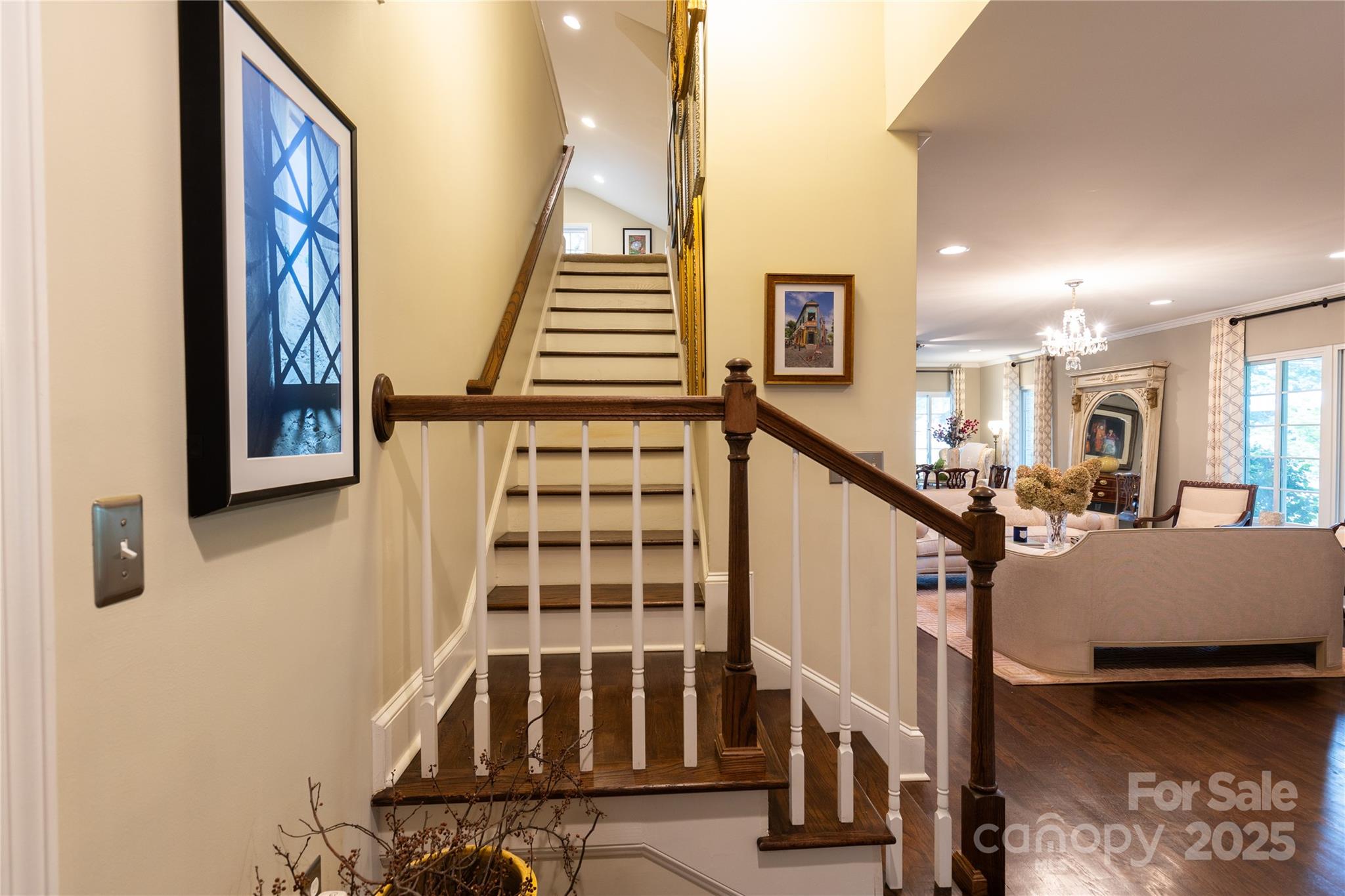 802 East Franklin Street Monroe, NC 28112 - Photo 32 of 48 a view of staircase with lots of furniture and windows