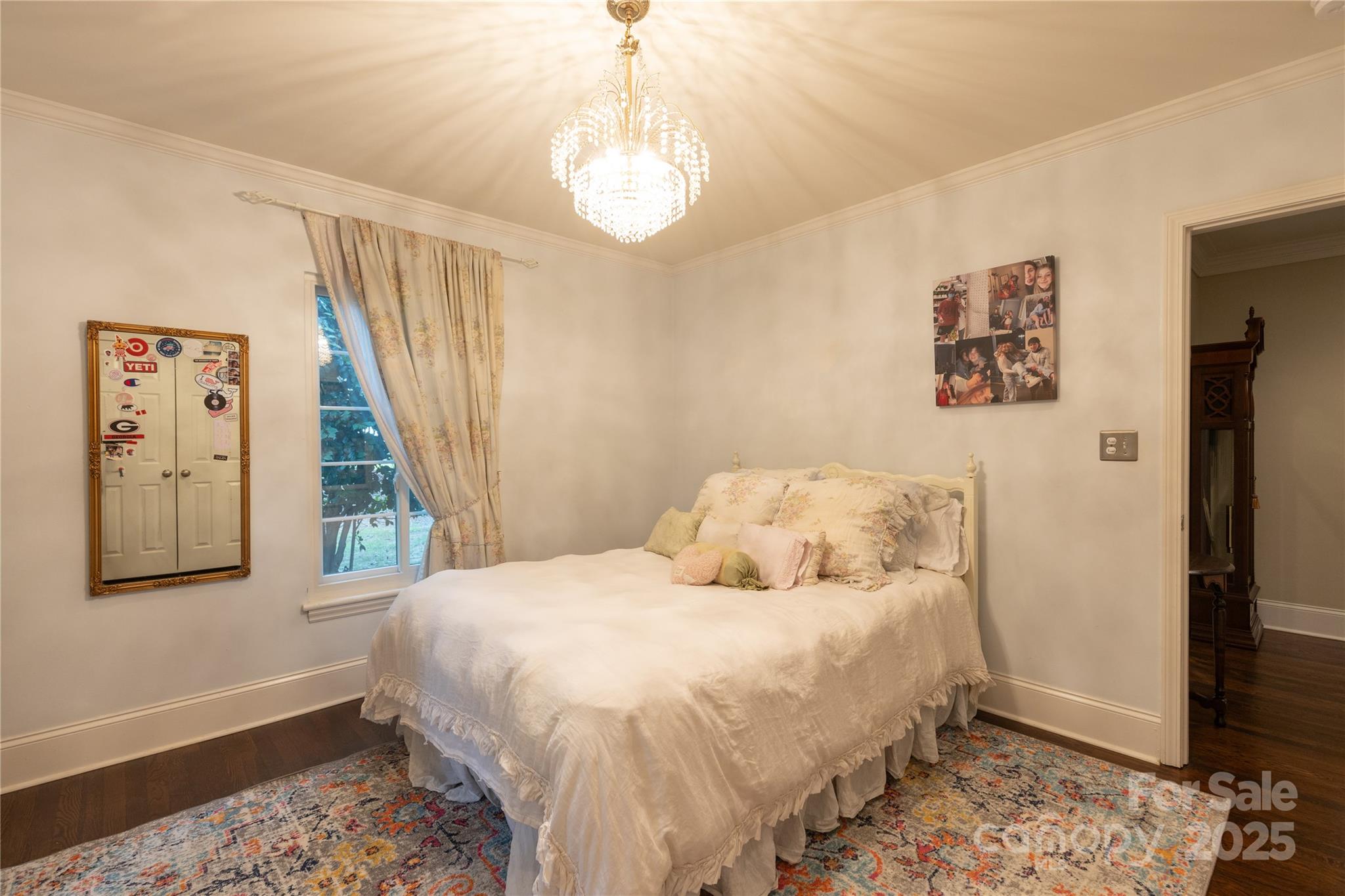 802 East Franklin Street Monroe, NC 28112 - Photo 34 of 48 a bedroom with a bed and a window