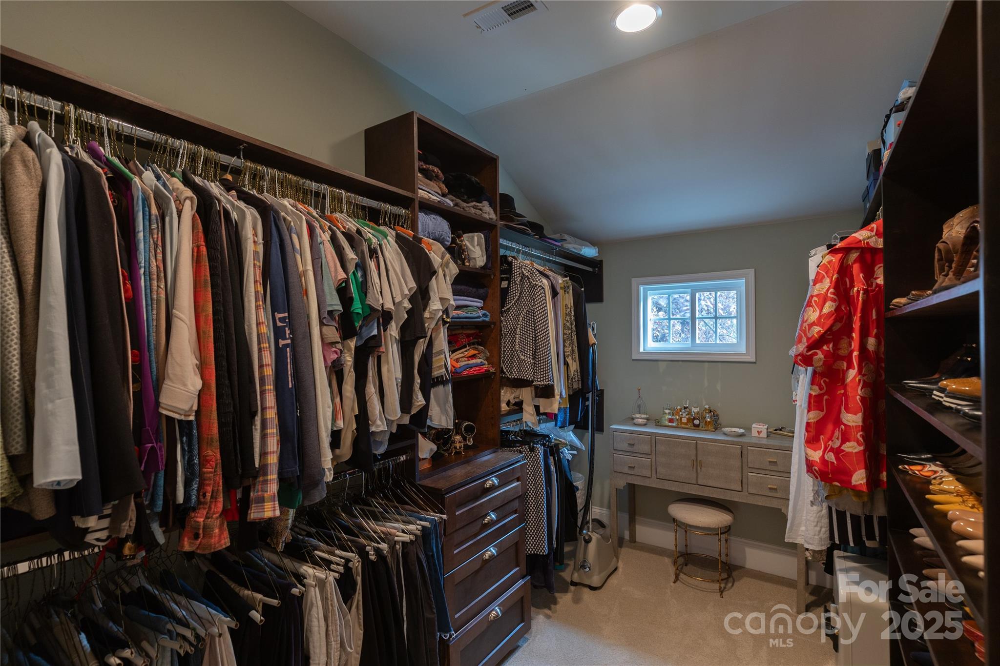 802 East Franklin Street Monroe, NC 28112 - Photo 41 of 48 a view of walk in closet with clothes and shoes