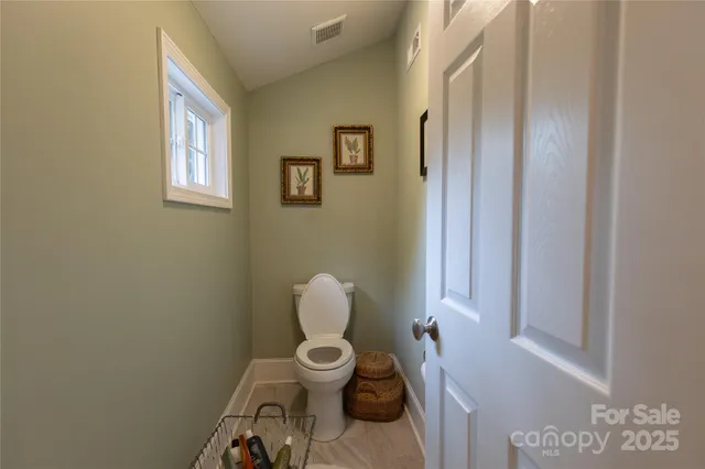a view of bathroom with a toilet