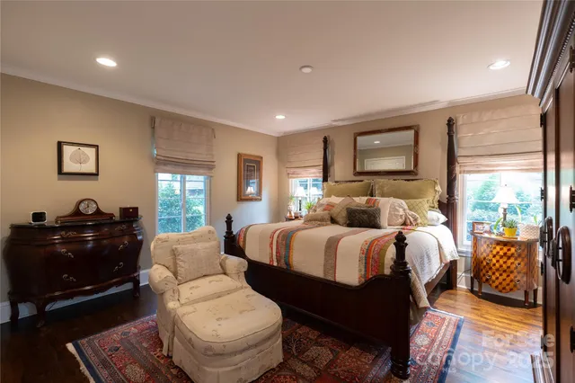 a bed room with bed and a window