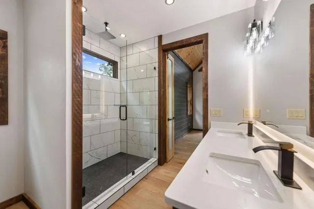 a bathroom with a tub and a shower