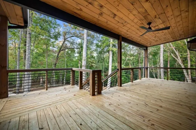 a view of balcony with wooden floor
