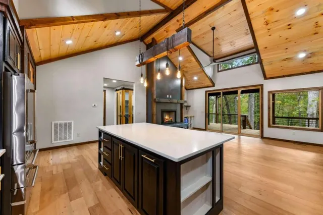 a view of an entryway with a table and chairs