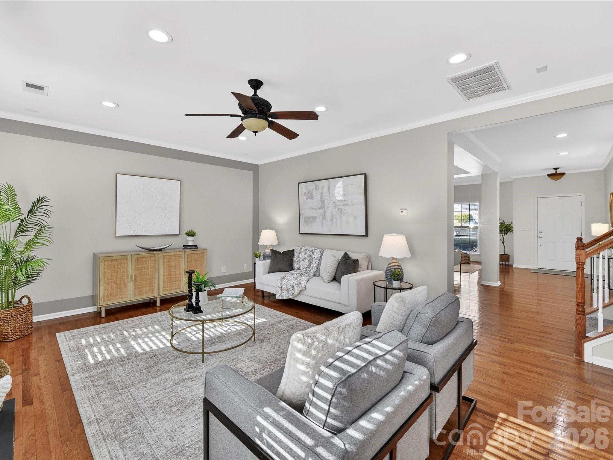119 Edgington Street Mooresville, NC 28115 - Photo 11 of 43 a living room with furniture and wooden floor