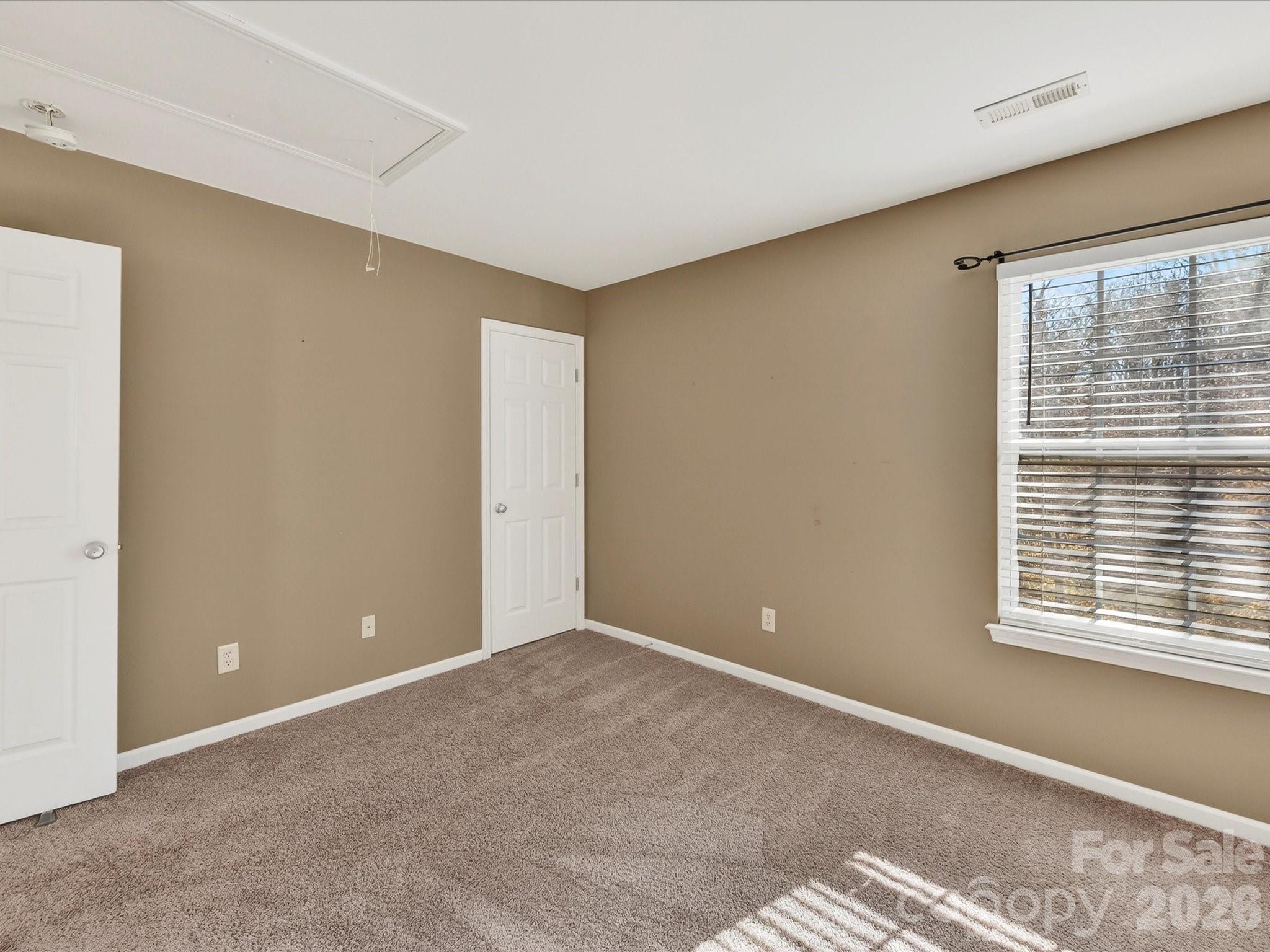 119 Edgington Street Mooresville, NC 28115 - Photo 26 of 43 a view of an empty room with a window