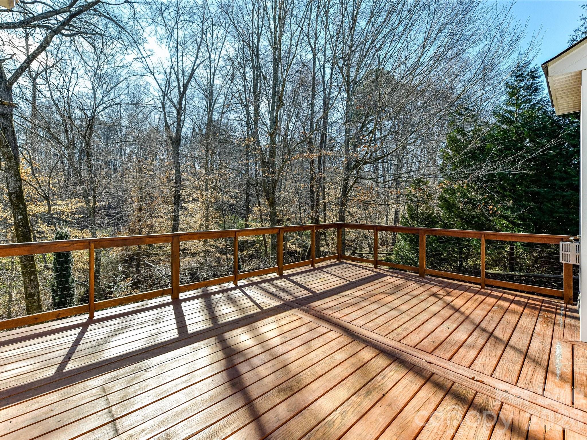 119 Edgington Street Mooresville, NC 28115 - Photo 29 of 43 a view of balcony with wooden floor and fence