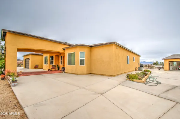 a view of a bedroom with a bed and toys