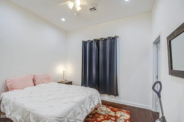 a kitchen with stainless steel appliances granite countertop a refrigerator and a stove