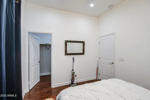 a kitchen with stainless steel appliances a refrigerator and a stove