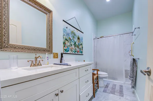 a view of a livingroom with wooden floor