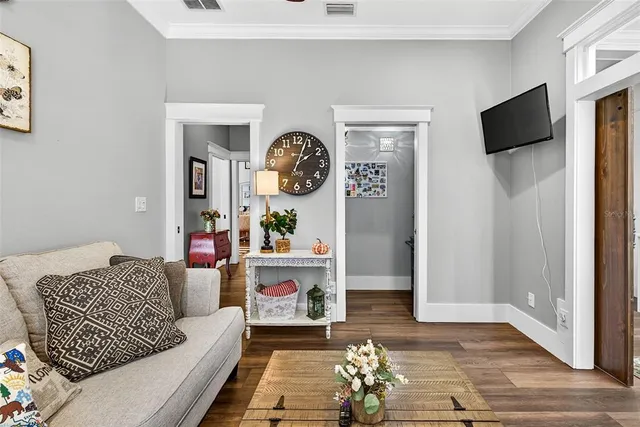 a kitchen with stainless steel appliances kitchen island granite countertop a sink and cabinets