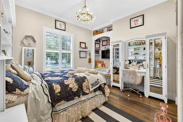 a view of a swimming pool with a chairs