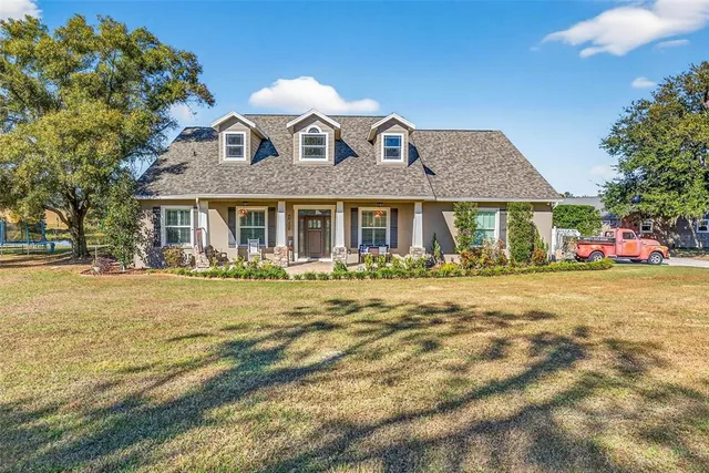 front view of a house with a patio