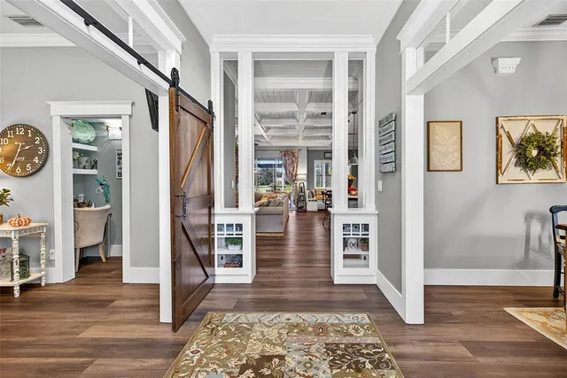 a view of living room with furniture and a rug