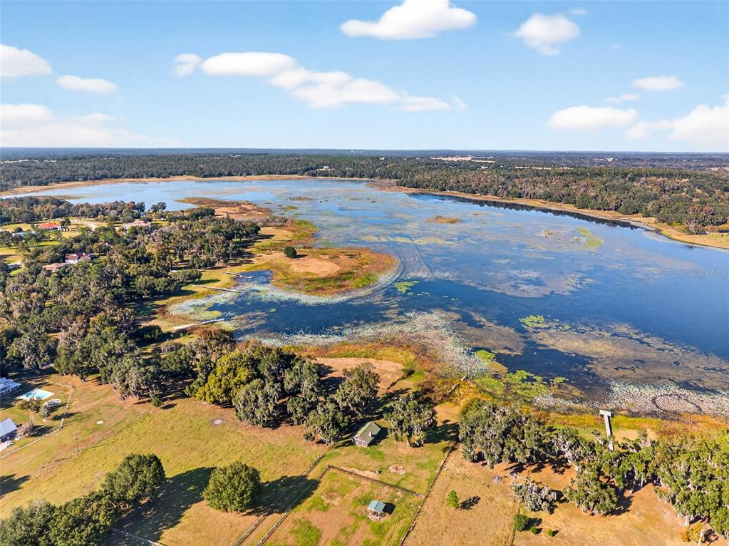 18051 Hancock Bluff Road Dade City, FL 33523 - Photo 94 of 98 a view of an ocean and beach