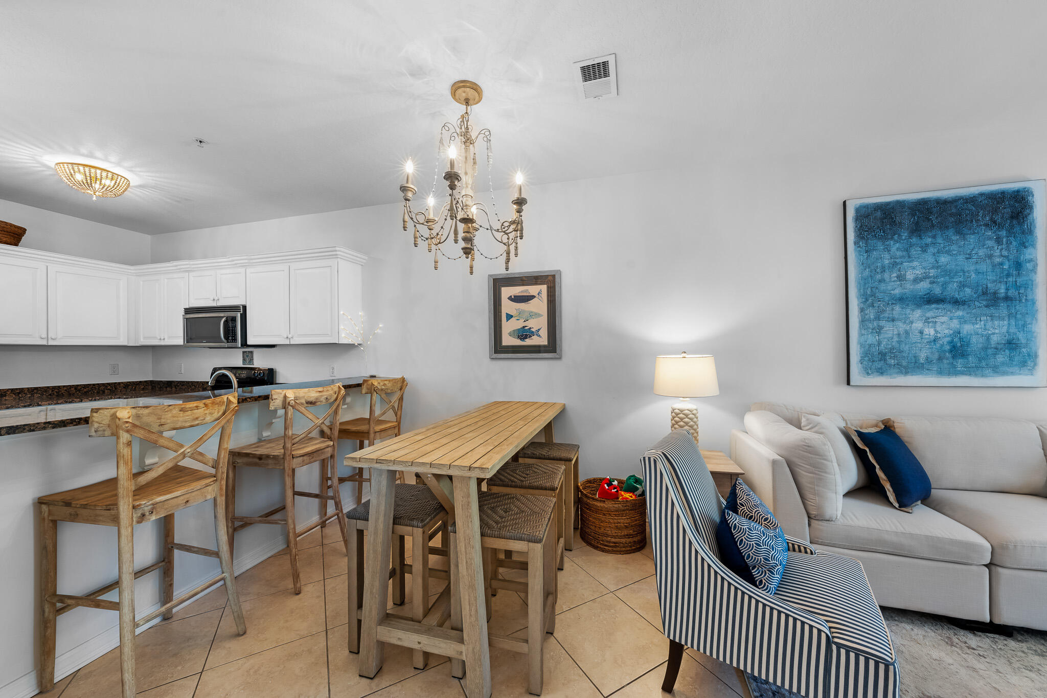34 Heron's Watch Way, Unit 7205 Santa Rosa Beach, FL 32459 - Photo 11 of 49 a living room with furniture a dining table and chairs
