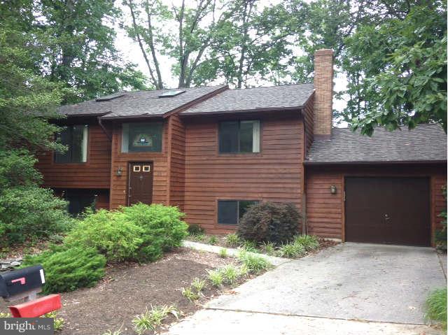 58 Jones Station Road Arnold, MD 21012 - Photo 1 of 28 Cedar Plank Siding Custom Split Foyer with Garage