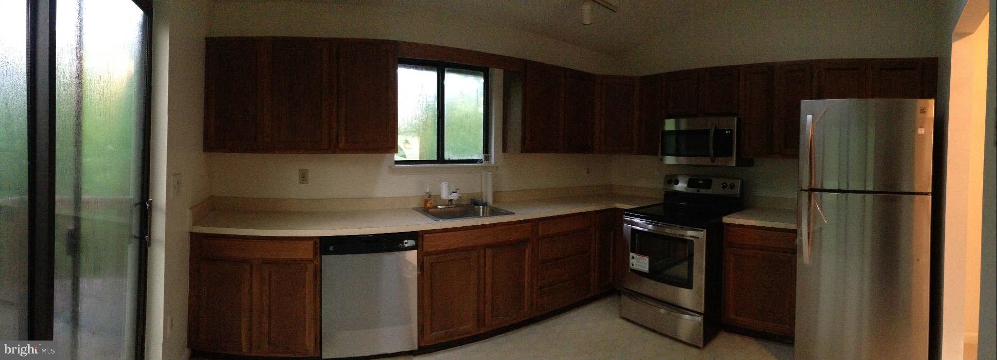 58 Jones Station Road Arnold, MD 21012 - Photo 12 of 28 Kitchen with table area and new SS appliances