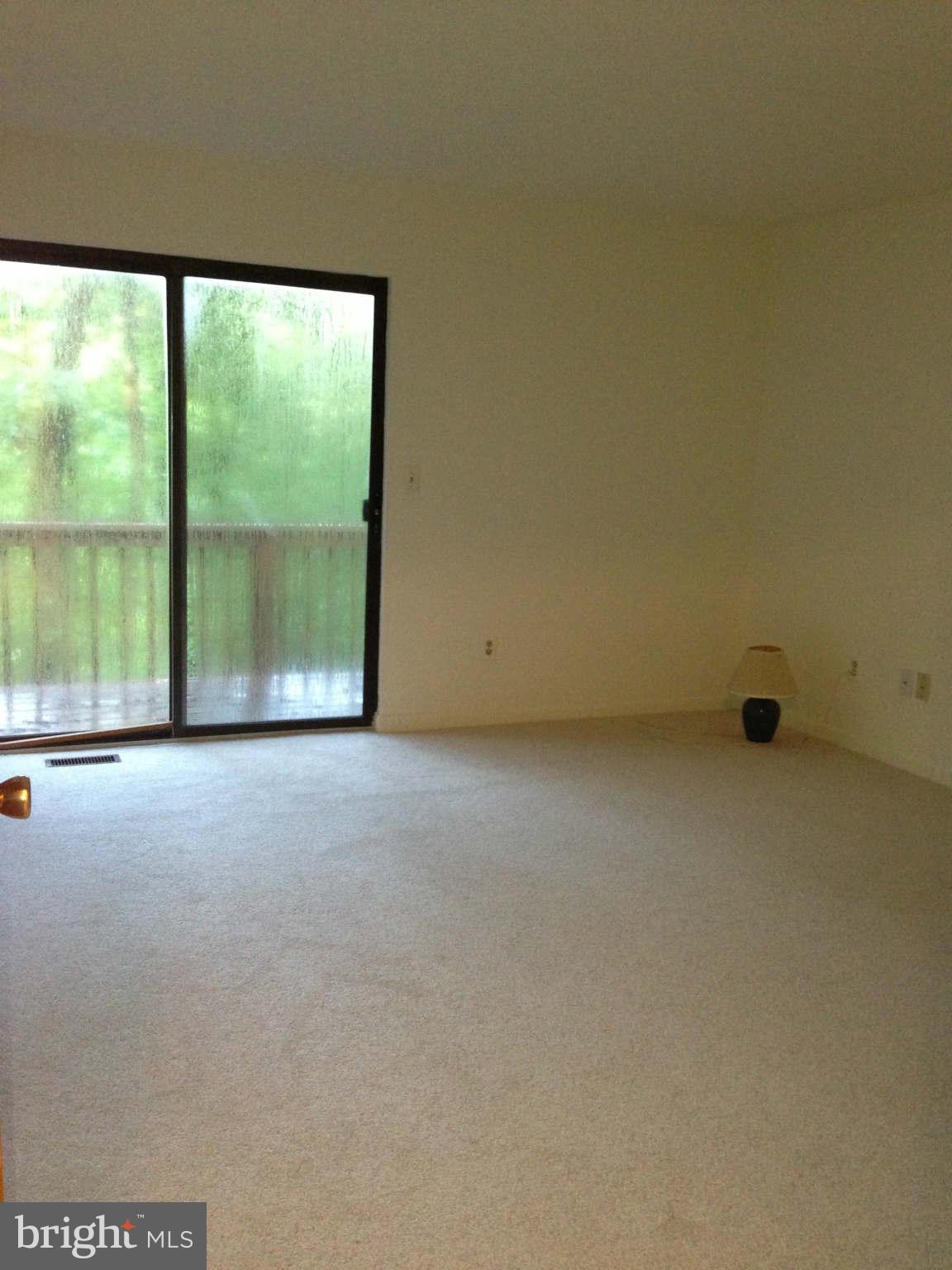 58 Jones Station Road Arnold, MD 21012 - Photo 16 of 28 Master bedroom with sliding doors to the deck