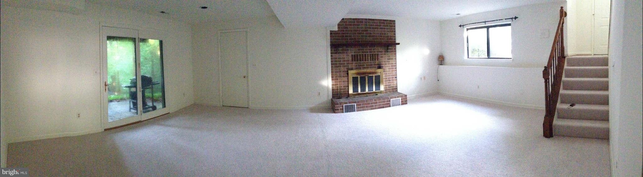 58 Jones Station Road Arnold, MD 21012 - Photo 6 of 28 Large Family Room w/FP and sliding doors