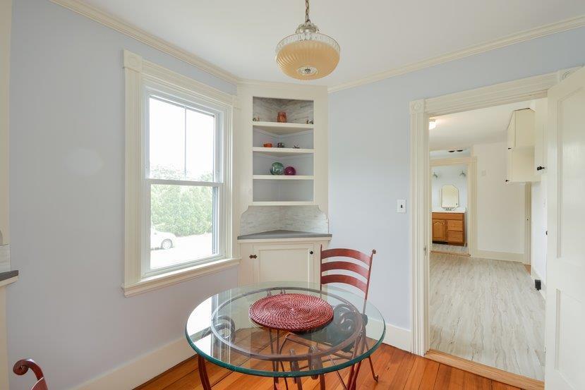 32 Fairhaven Road Mattapoisett, MA 02739 - Photo 5 of 11 a view of a dining room with furniture window and wooden floor