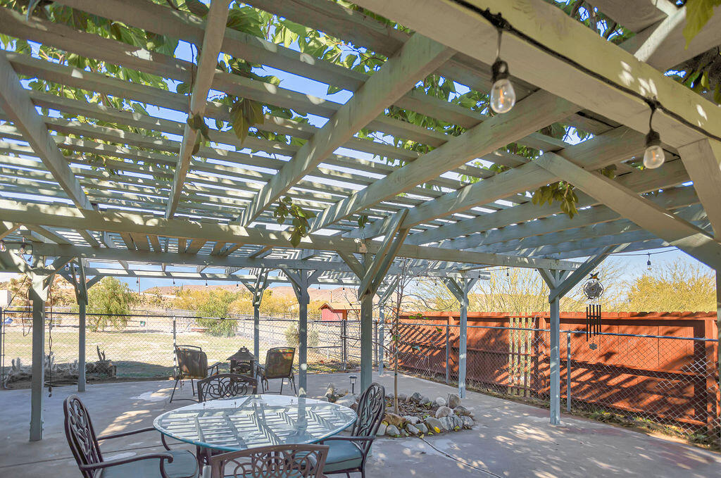 5134 Malin Way Yucca Valley, CA 92284 - Photo 21 of 27 a outdoor space with lots of glass windows