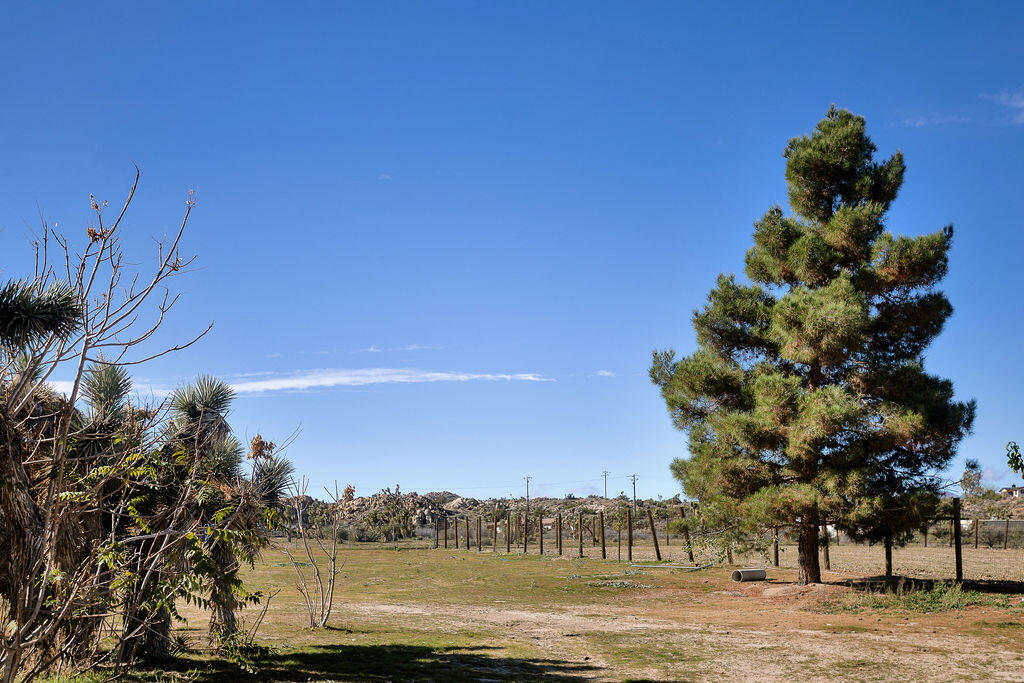 5134 Malin Way Yucca Valley, CA 92284 - Photo 24 of 27 a picture of a houses with a lake view