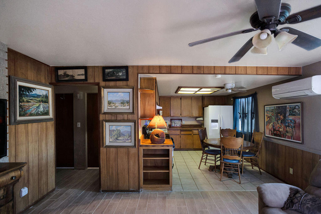 5134 Malin Way Yucca Valley, CA 92284 - Photo 10 of 27 a living room with furniture and a flat screen tv