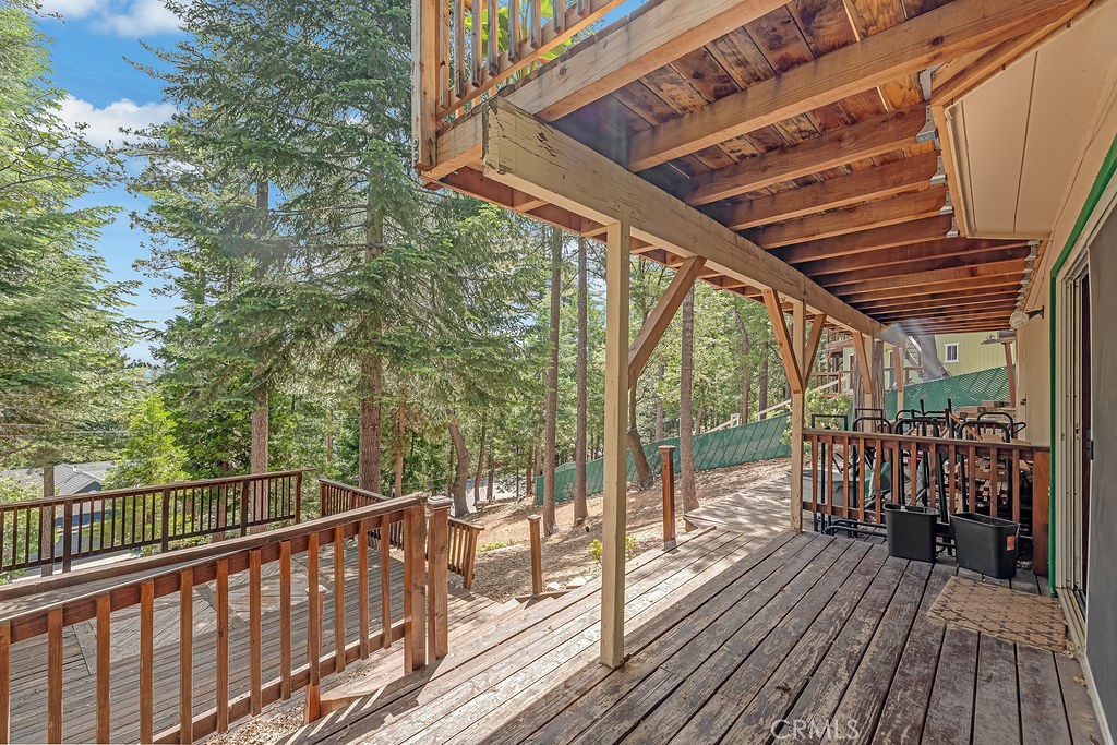 318 Old Toll Road Lake Arrowhead, CA 92352 - Photo 34 of 44 a view of a balcony with wooden floor