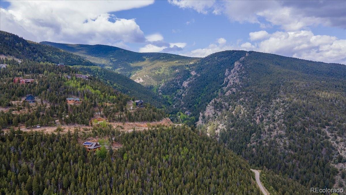 Clear Creek Road Evergreen, CO 80439 - Photo 21 of 26 a view of a house with a street