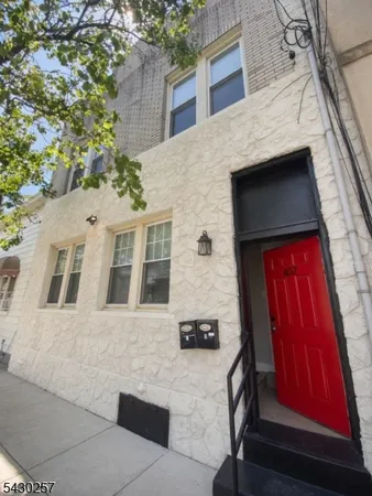 a view of front of house with a street